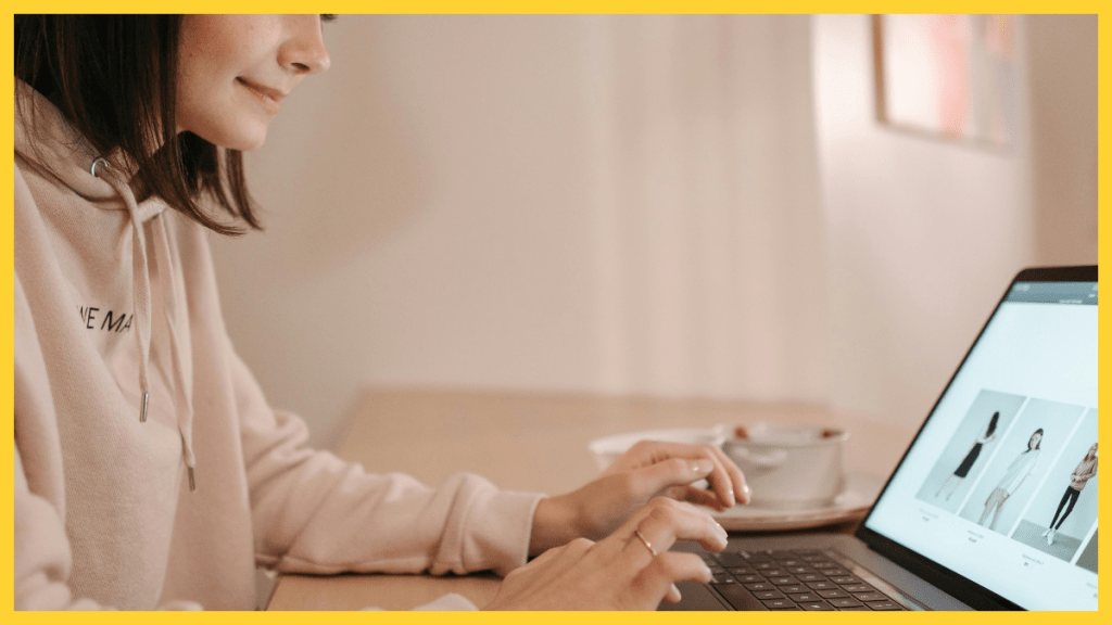 Woman working on a laptop at a table